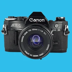 Canon AE-1 Black 35mm SLR Film Camera with Canon Prime Lens