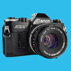 Canon AE-1 Black 35mm SLR Film Camera with Canon Prime Lens