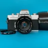 Minolta SRT303b 35mm SLR Film Camera w/ Prime Lens & Original Leather Case
