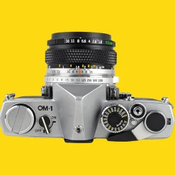 Olympus OM 1 Vintage 35mm SLR Film Camera with f/1.8 50mm Prime Lens
