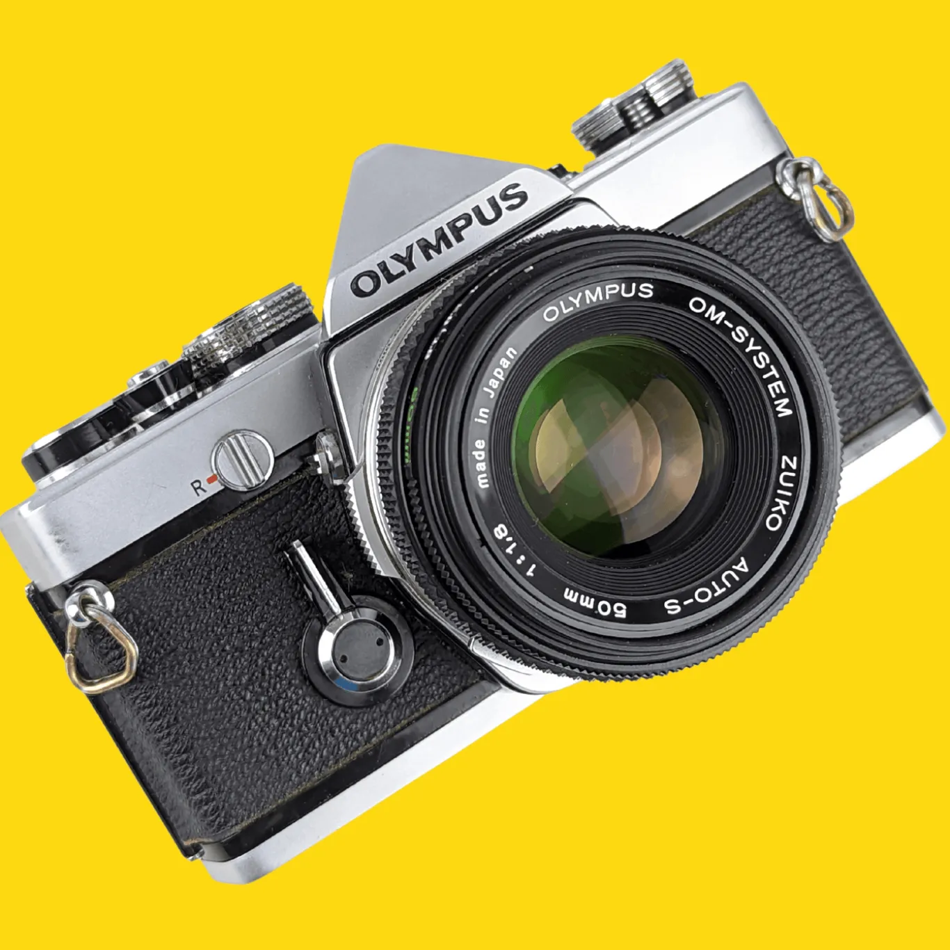 Olympus OM 1 Vintage 35mm SLR Film Camera with f/1.8 50mm Prime Lens