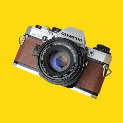 Olympus OM10 Brown Leather Vintage 35mm Film Camera w/ F/1.8 50mm Lens