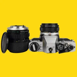 Olympus OM10 35mm Film Camera w/ f/1.8 50mm Lens and Zoom Lens