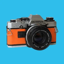 Olympus OM10 Orange Leather Vintage 35mm Film Camera w/ F/1.8 50mm Lens
