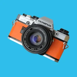 Olympus OM10 Orange Leather Vintage 35mm Film Camera w/ F/1.8 50mm Lens
