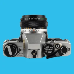 Olympus OM10 Vintage SLR 35mm Film Camera w/ 50mm f/1.8 Prime Lens