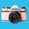 Pentax K1000 Pink Leather Vintage SLR 35mm Film Camera with Pentax f/2 50mm Prime Lens.