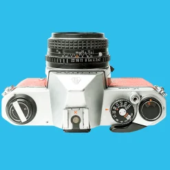 Pentax K1000 Red Leather Vintage SLR 35mm Film Camera with Pentax f/2 50mm Prime Lens.